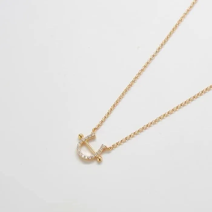 Gold Pave Horseshoe Necklace sold by Admiral Row