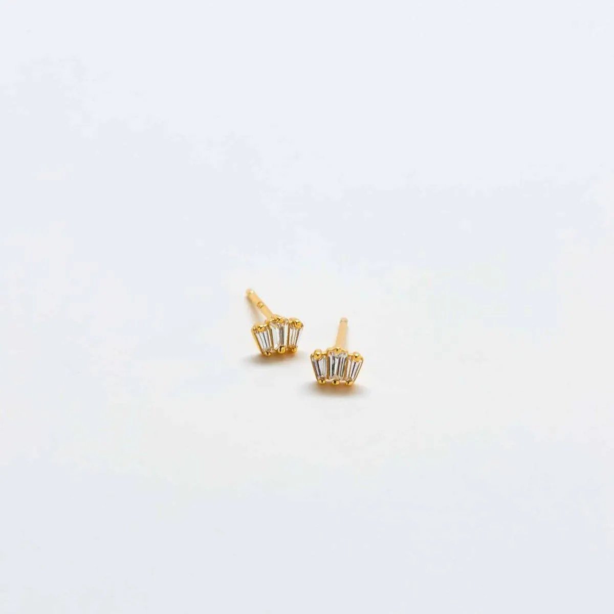 White Trio Baguette Gold Studs sold by Admiral Row