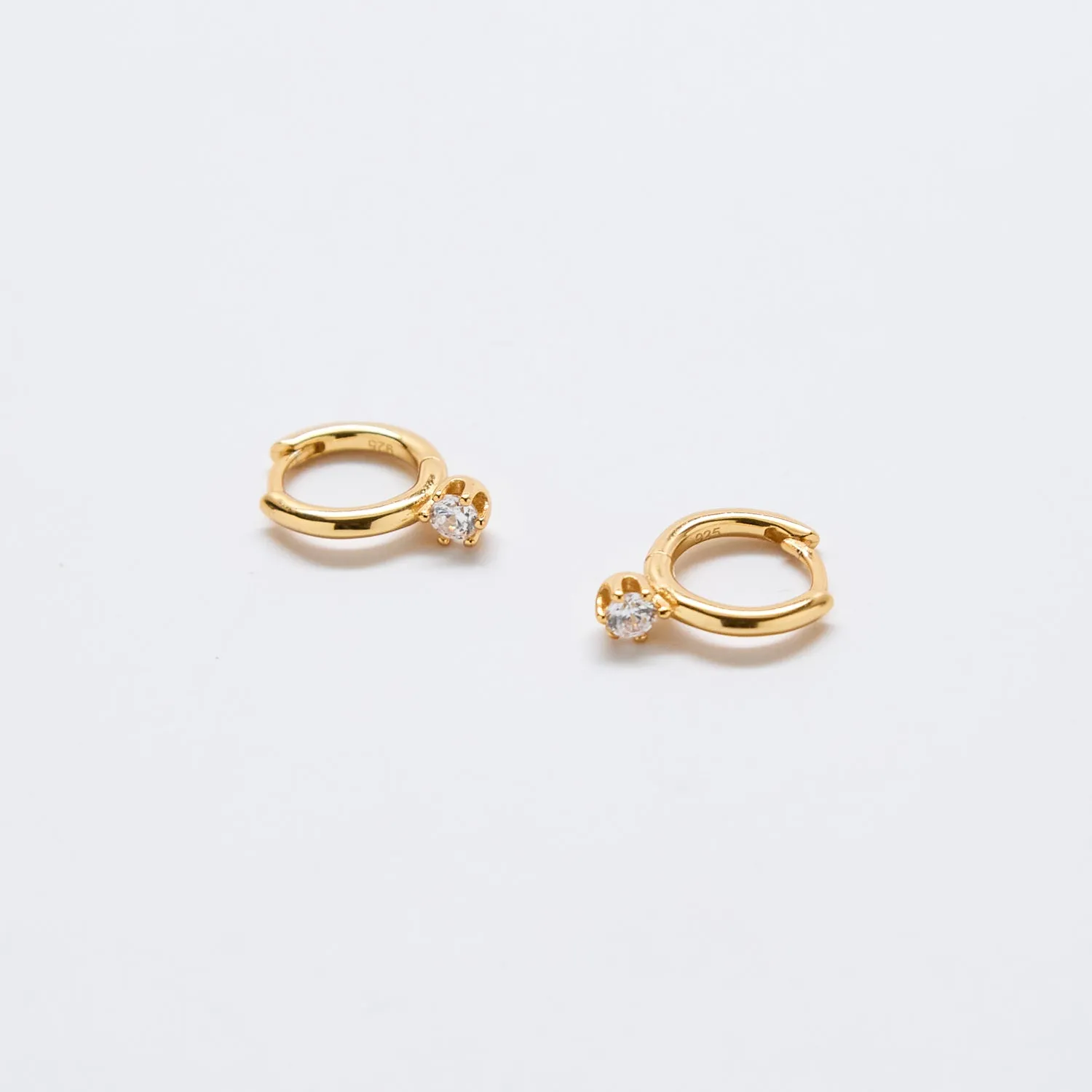 White Pave Round Huggie Earrings sold by Admiral Row