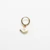 CZ Gold Eye Huggie Earrings sold by Admiral Row