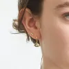 CZ Gold Eye Huggie Earrings sold by Admiral Row