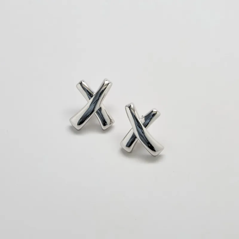 Monet Silver-Tone Crossover Stud Earrings sold by Admiral Row