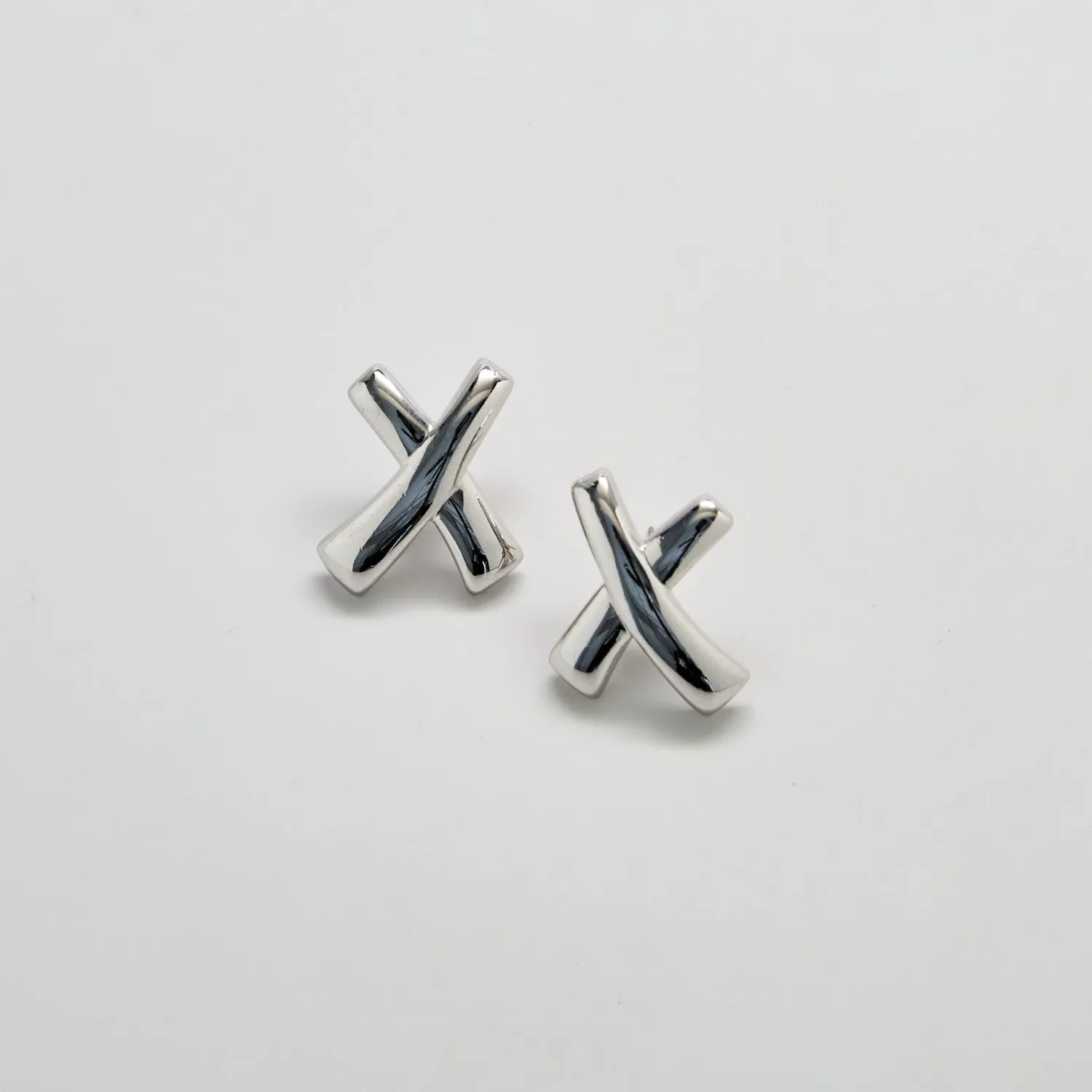 Monet Silver-Tone Crossover Stud Earrings sold by Admiral Row