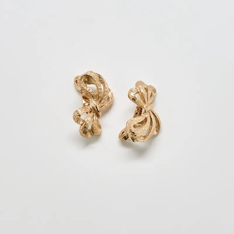 Vintage Monet Gold Bow Clip-On Earrings sold by Admiral Row