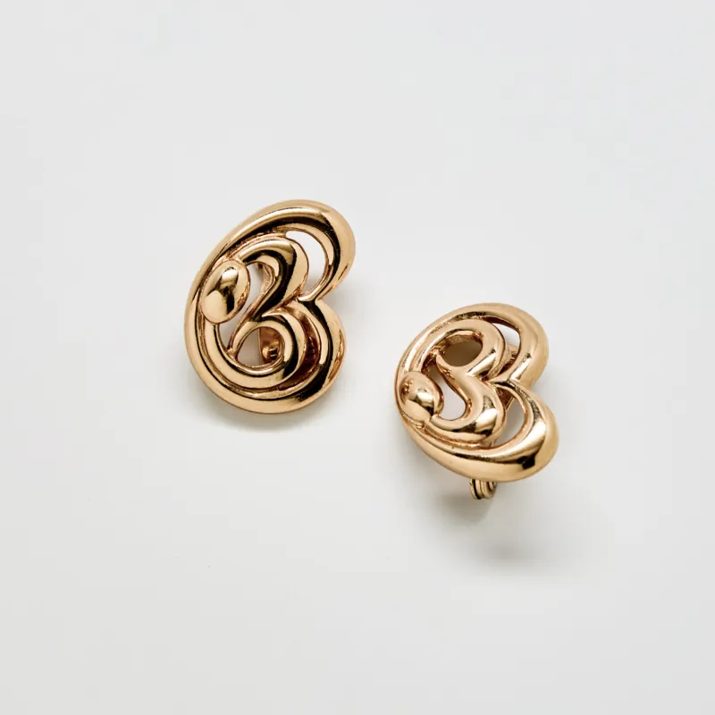 Vintage Monet Abstract Gold Clip-On Earrings sold by Admiral Row