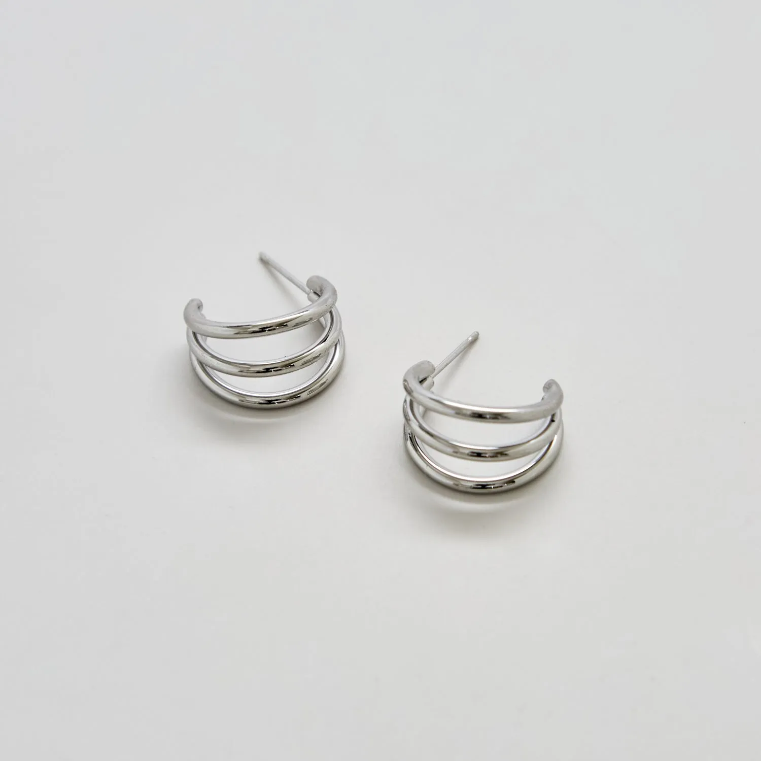 Triple Arc Silver Hoop Earrings sold by Admiral Row