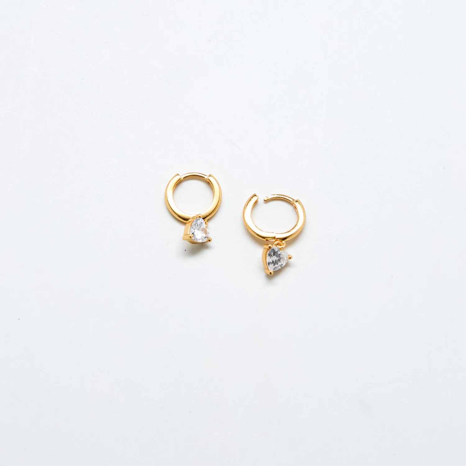 Gold CZ Heart Huggie Earrings sold by Admiral Row product image thumbnail 3