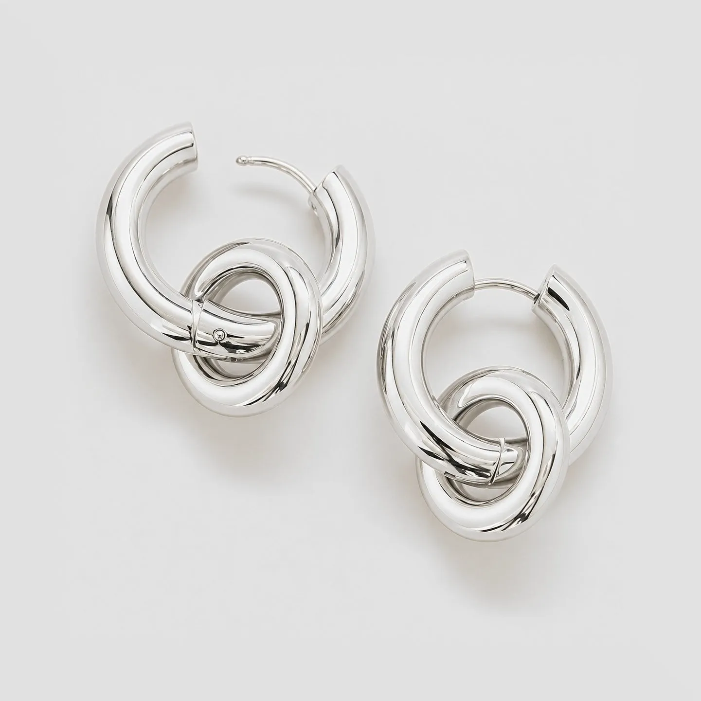 Silver Interlocking Hoop Earrings sold by Admiral Row product image thumbnail 3