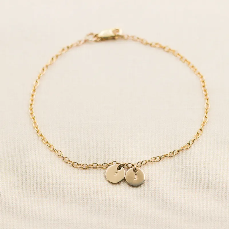 Multi Pendant Bracelet sold by Elysium Hope