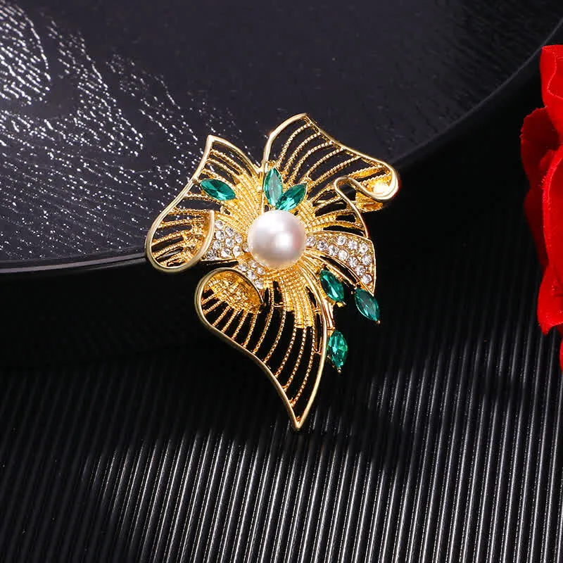 Women's Gold Hollow Leaf Pearl Rhinestone Brooch sold by FloralTrip
