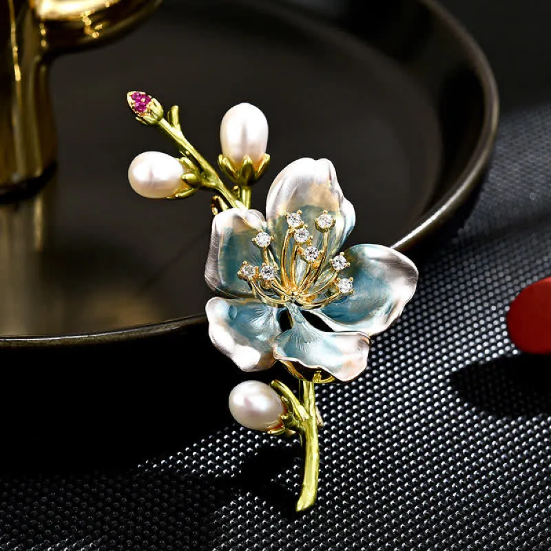 Women's Blue Enamel Magnolia Flower Faux Pearl Brooch sold by FloralTrip