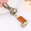 Cute Mini Hammer Bow Knot Leather Keychain sold by FloralTrip