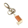 Cute Mini Hammer Bow Knot Leather Keychain sold by FloralTrip