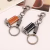 Street Style Hammer Carved Skull Leather Keychain sold by FloralTrip