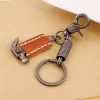 Street Style Hammer Carved Skull Leather Keychain sold by FloralTrip