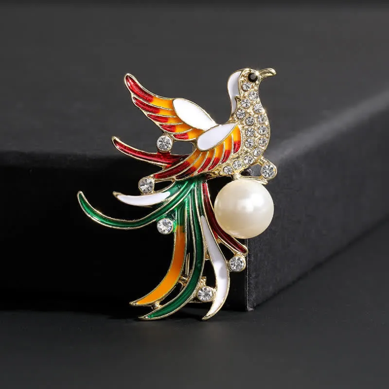 Women's Colourful Flying Phoenix Bird Brooch sold by FloralTrip