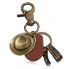 Retro Ancient Bronze Cowboy Hat Leather Keychain sold by FloralTrip