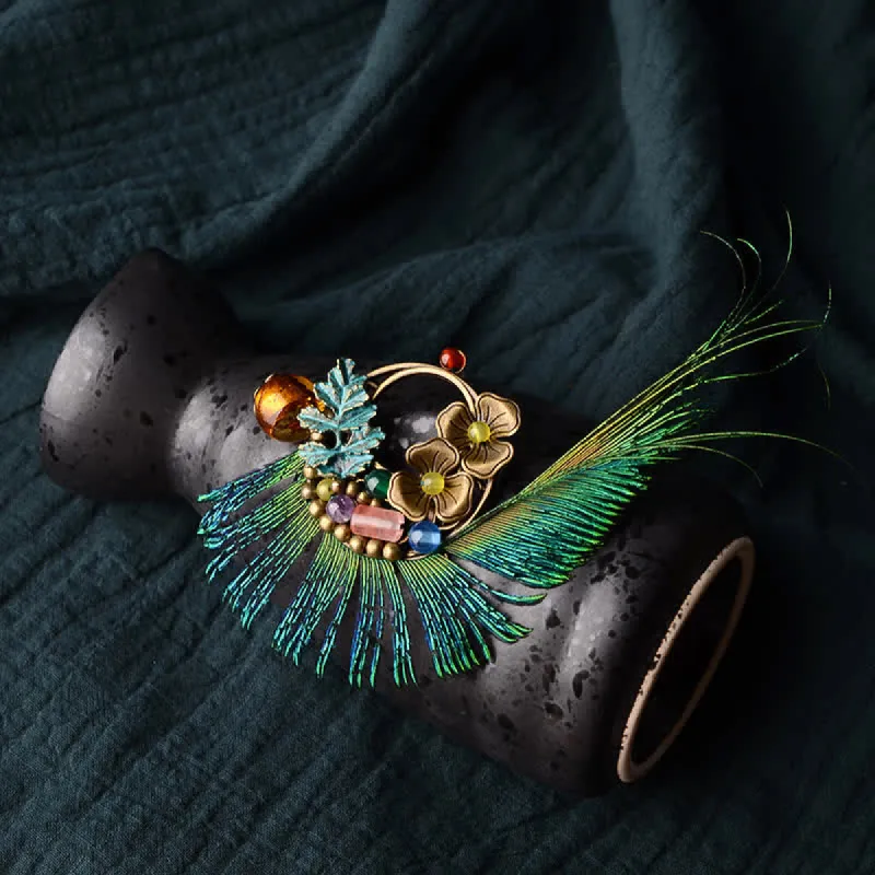 Women's Retro Bronze Flower Peacock Feather Brooch sold by FloralTrip