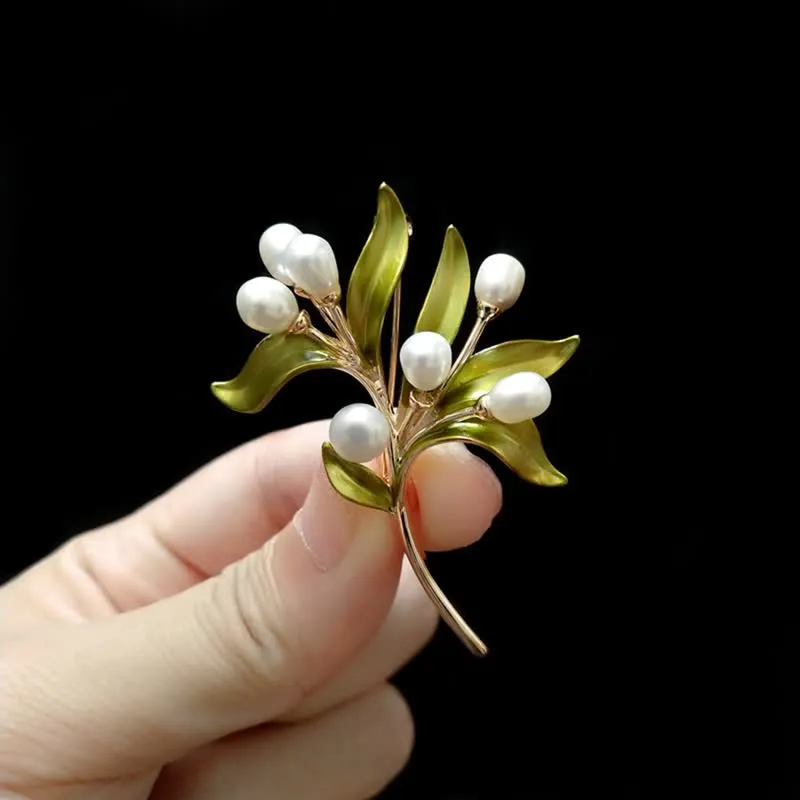 Women's Natural Pearl Olive Branch Brooch sold by FloralTrip