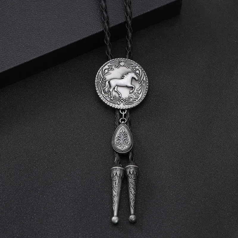 West Horse Carving Detailed Bolo Tie with Little Pendant sold by FloralTrip