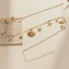 Women's Bohemian Beach Starfish Conch Shell Faux Pearl Waist Chain sold by FloralTrip