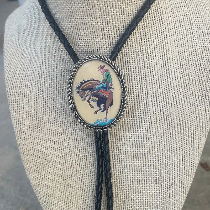 Colorful Cowboy Riding Horse Pendant Braided Leather Bolo Tie sold by FloralTrip