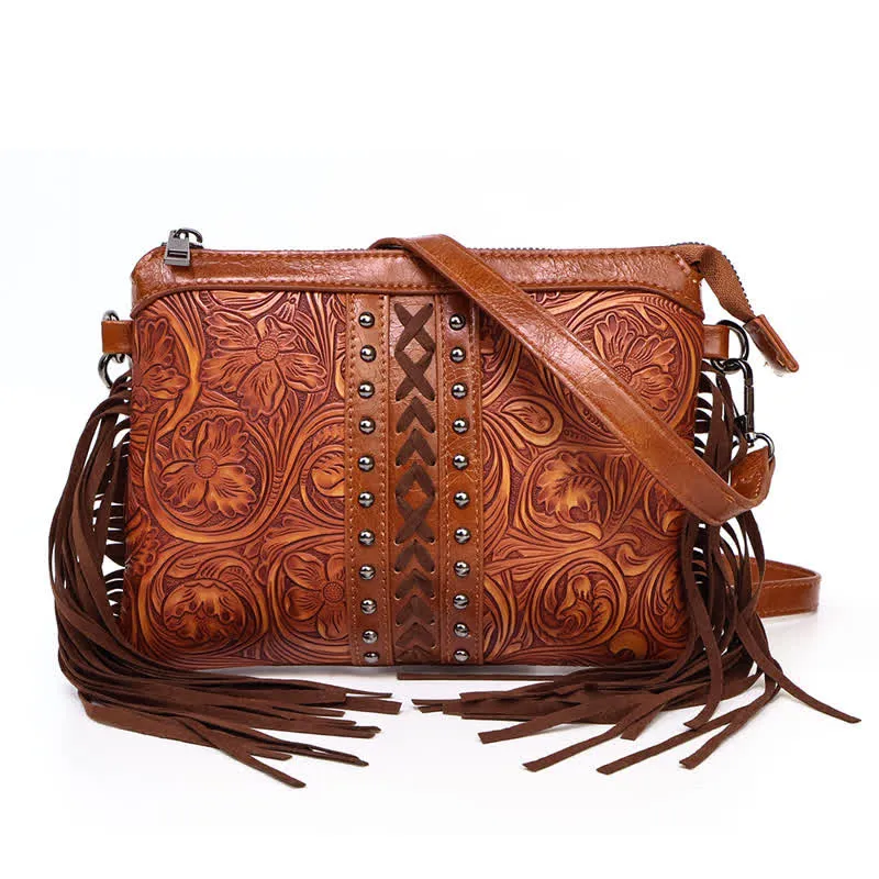 Women's Engraved Boho Flower Pattern Fringe Crossbody Bag sold by FloralTrip