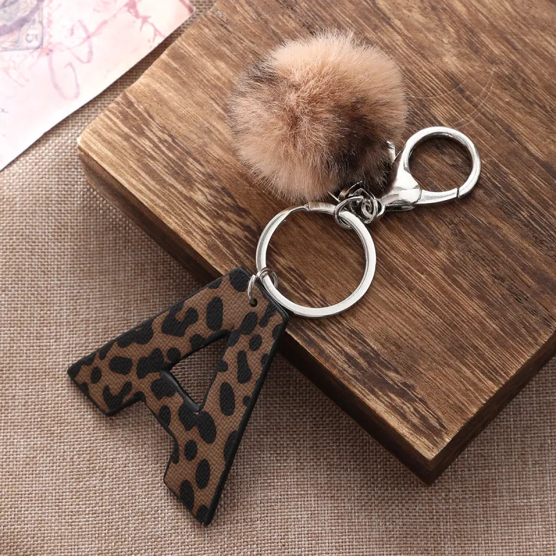 Western Style Leopard Print Letter Leather Keychain With Plush Ball sold by FloralTrip