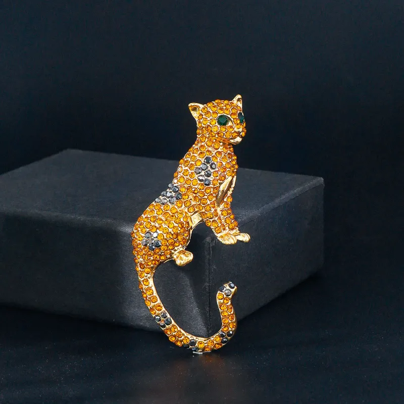 Golden Diamond Studded Emerald Green Eyes Cheetah Brooch sold by FloralTrip