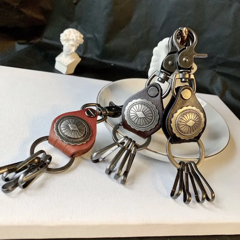 Vintage Silver Round Leather Keychain With Pendant sold by FloralTrip