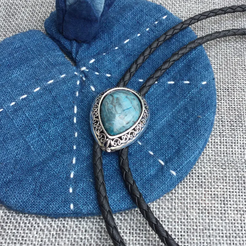 Teardrop Turquoise Vintage Carved Metal Bolo Ties sold by FloralTrip