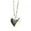 Gold ILY Locket Necklace sold by The Sage Vintage