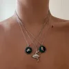 Silver Boot Necklace sold by The Sage Vintage