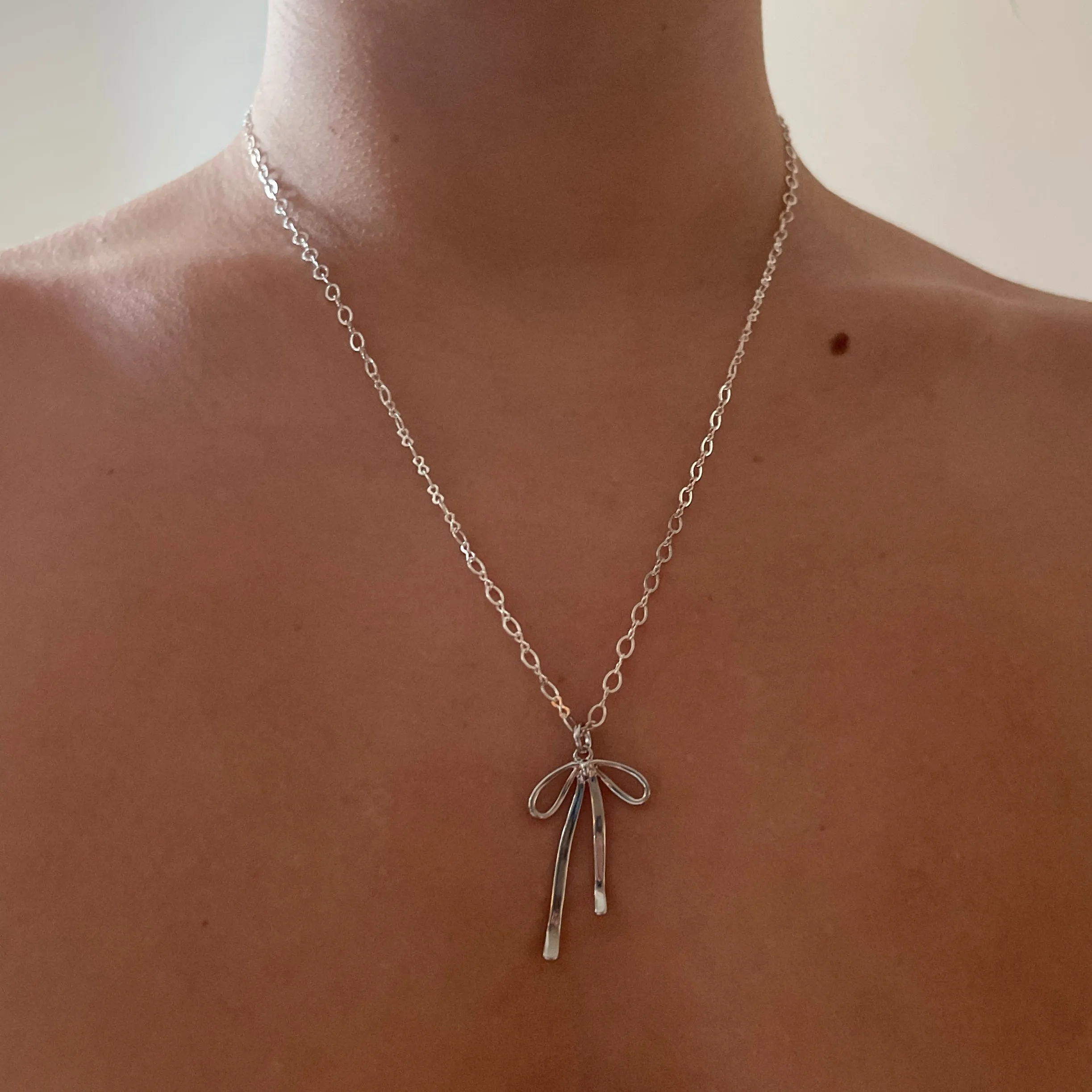 Silver Bow Necklace sold by The Sage Vintage product image thumbnail 2