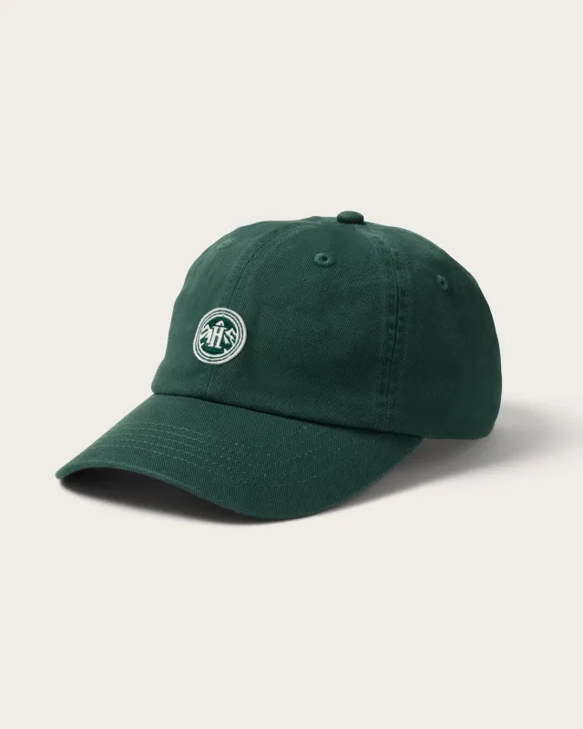 Peak Cap in Emerald sold by Hemlock Hat Co