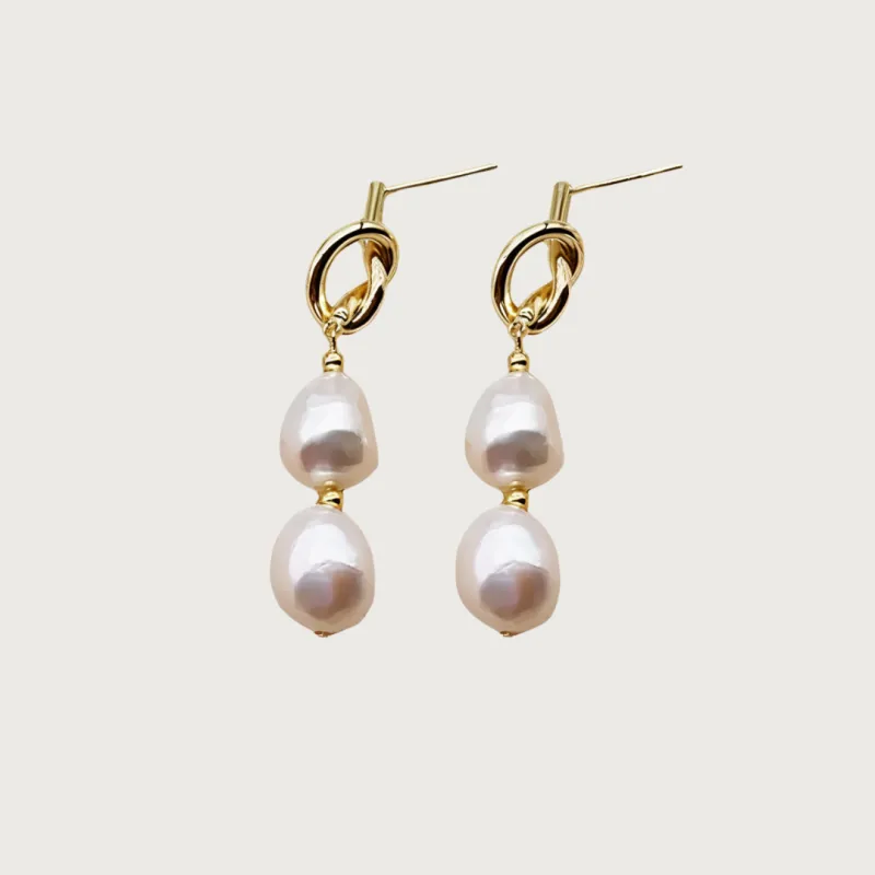 ‍Free Pearl Drop Earrings sold by Cadena