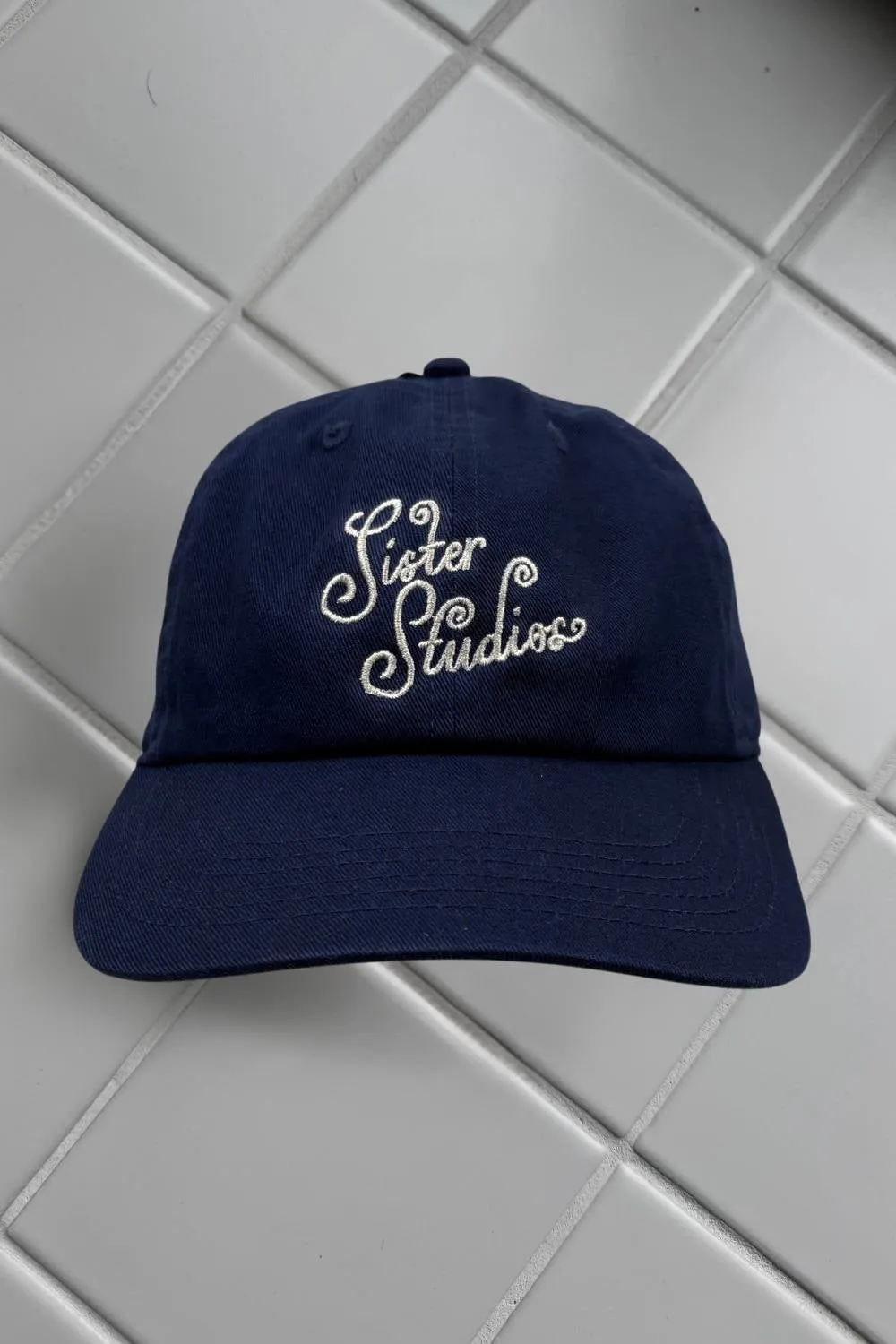 CURLY LOGO CAP | NAVY sold by SISTER Studios