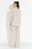 Compleu cu pantaloni crem Nikanor Bogas sold by bogas