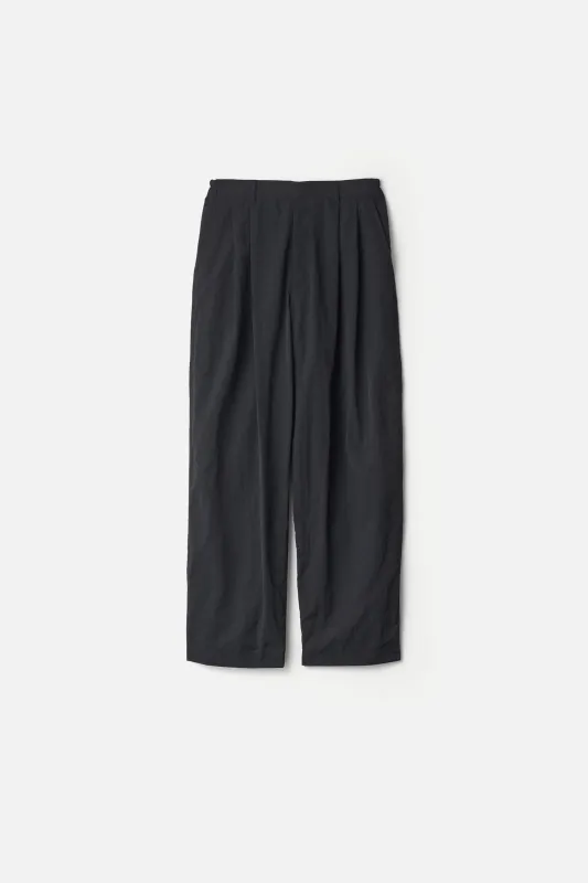 WINDPROOF NYLON WIDE EASY TROUSERS made by ssstein