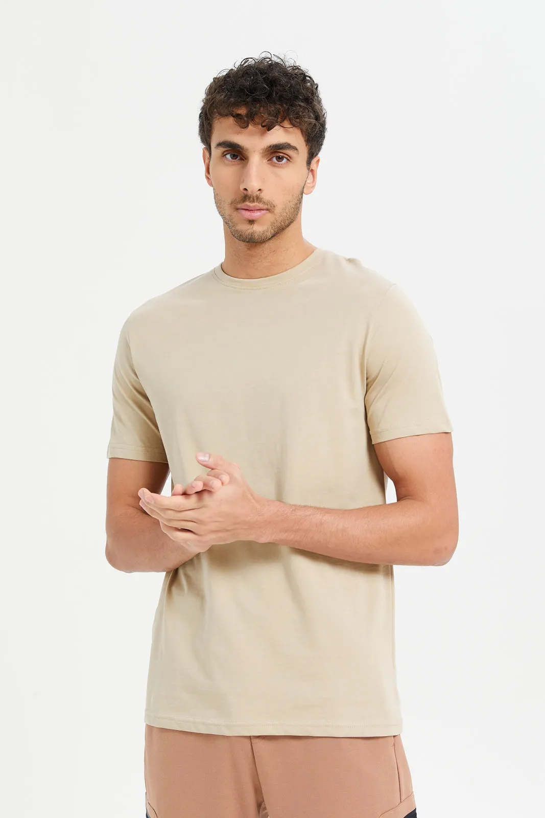 Men Beige Plain Round Neck T-Shirt sold by Redtag