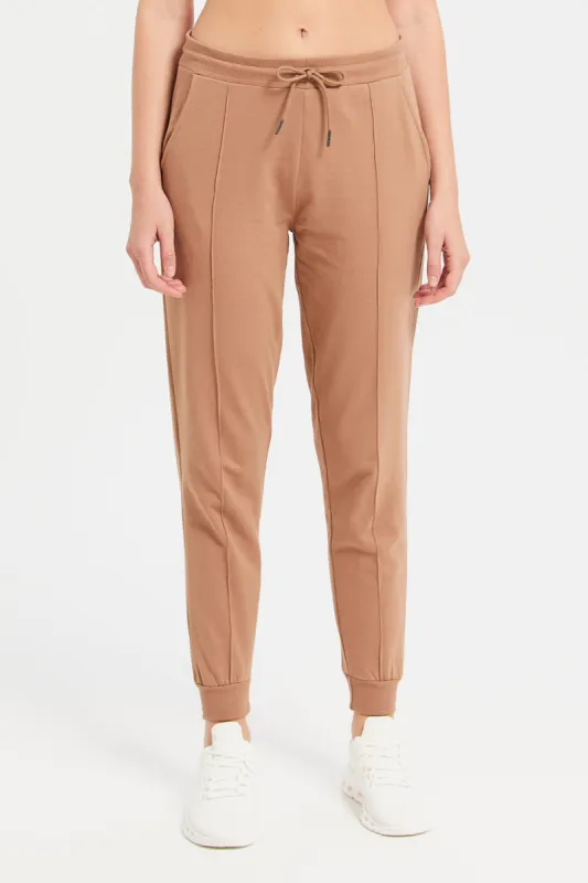 Women Rust Solid Jogger Pants With Pockets sold by Redtag