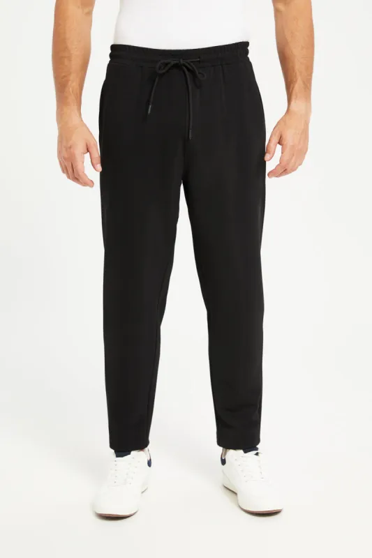 Men Black Plain Casual Trouser sold by Redtag