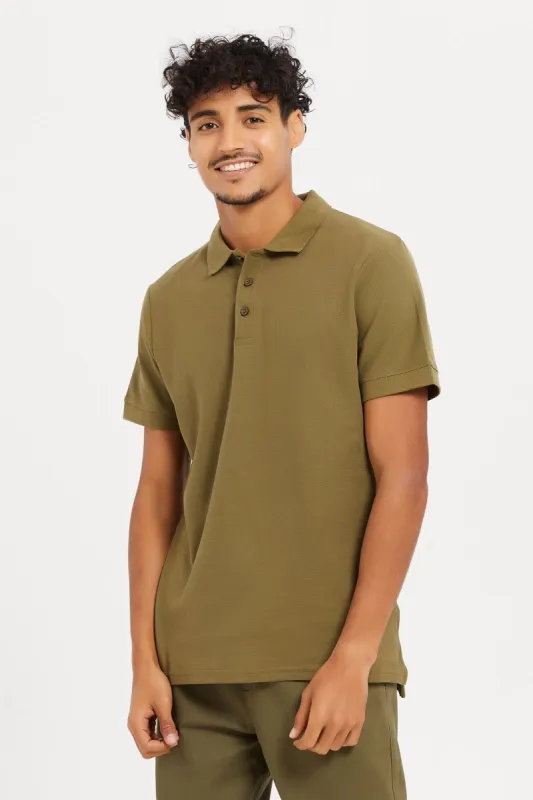 Men Green Plain Polo Shirt sold by Redtag