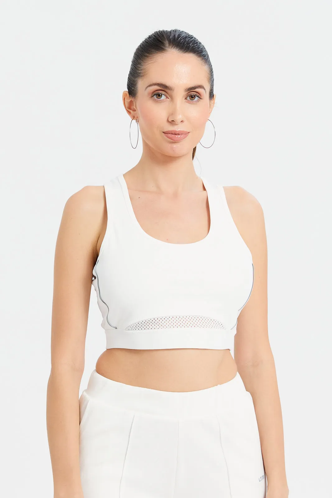 Women White Sports Bra With Reflector sold by Redtag