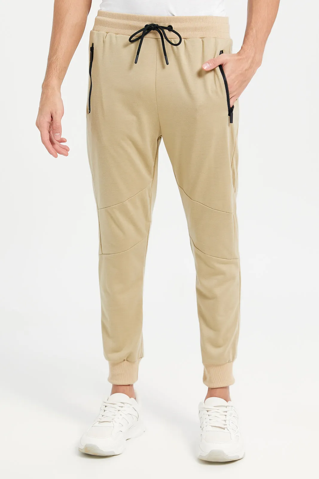 Men Beige Slim Fit Active Pants sold by Redtag