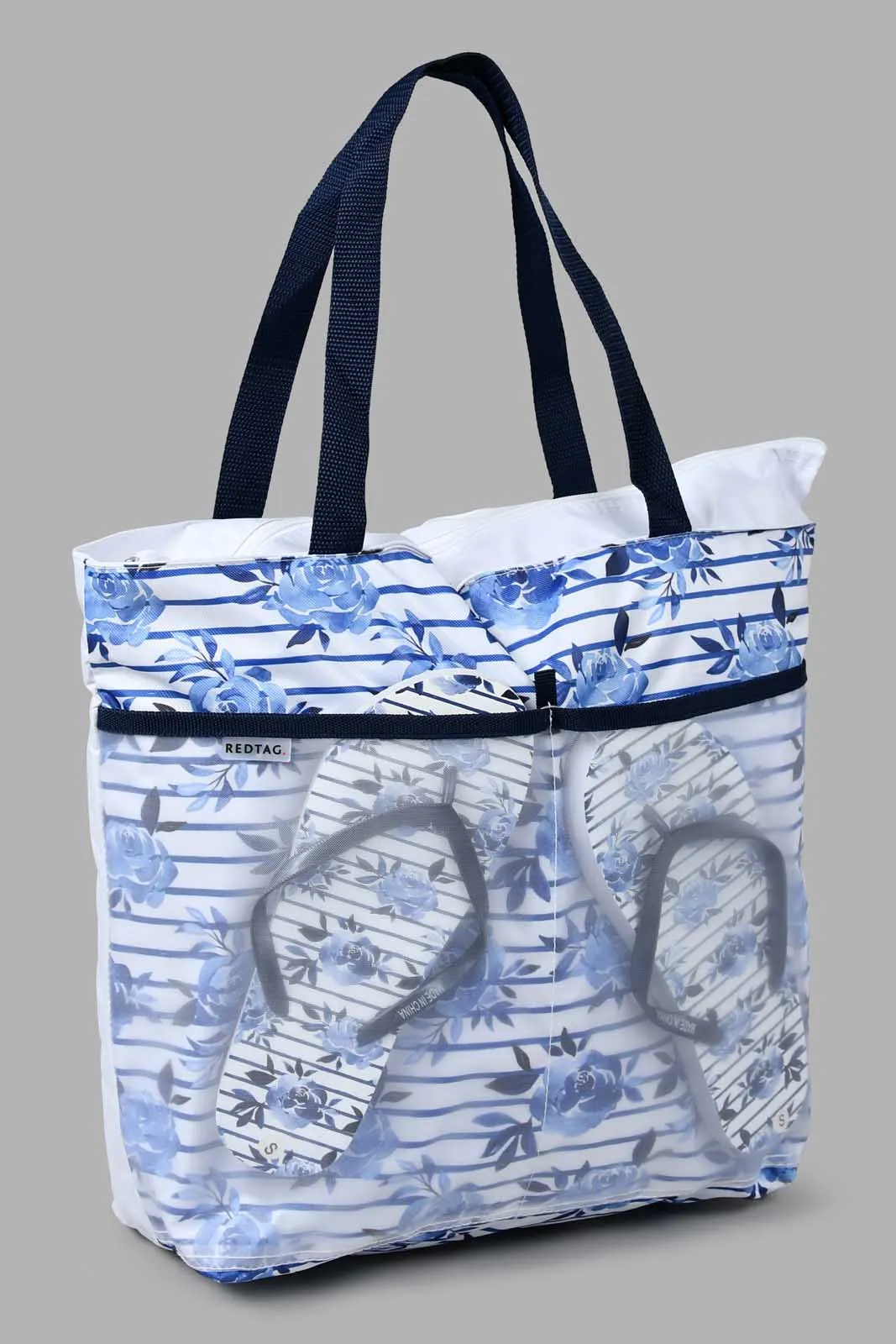 White And Navy Printed Beach Bag With Flip Flop (2 Piece) sold by Redtag