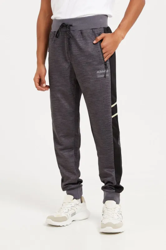 Men Charcoal Embellished Active Pants sold by Redtag