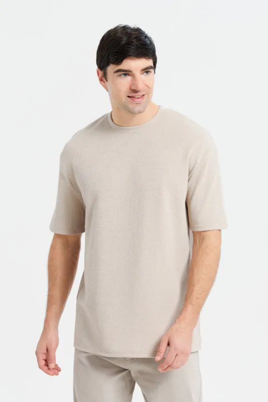 Men Beige Oversize Textured T-Shirt sold by Redtag