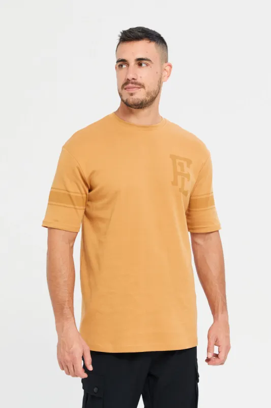 Men Yellow Printed  Longline Varsity T-Shirt sold by Redtag