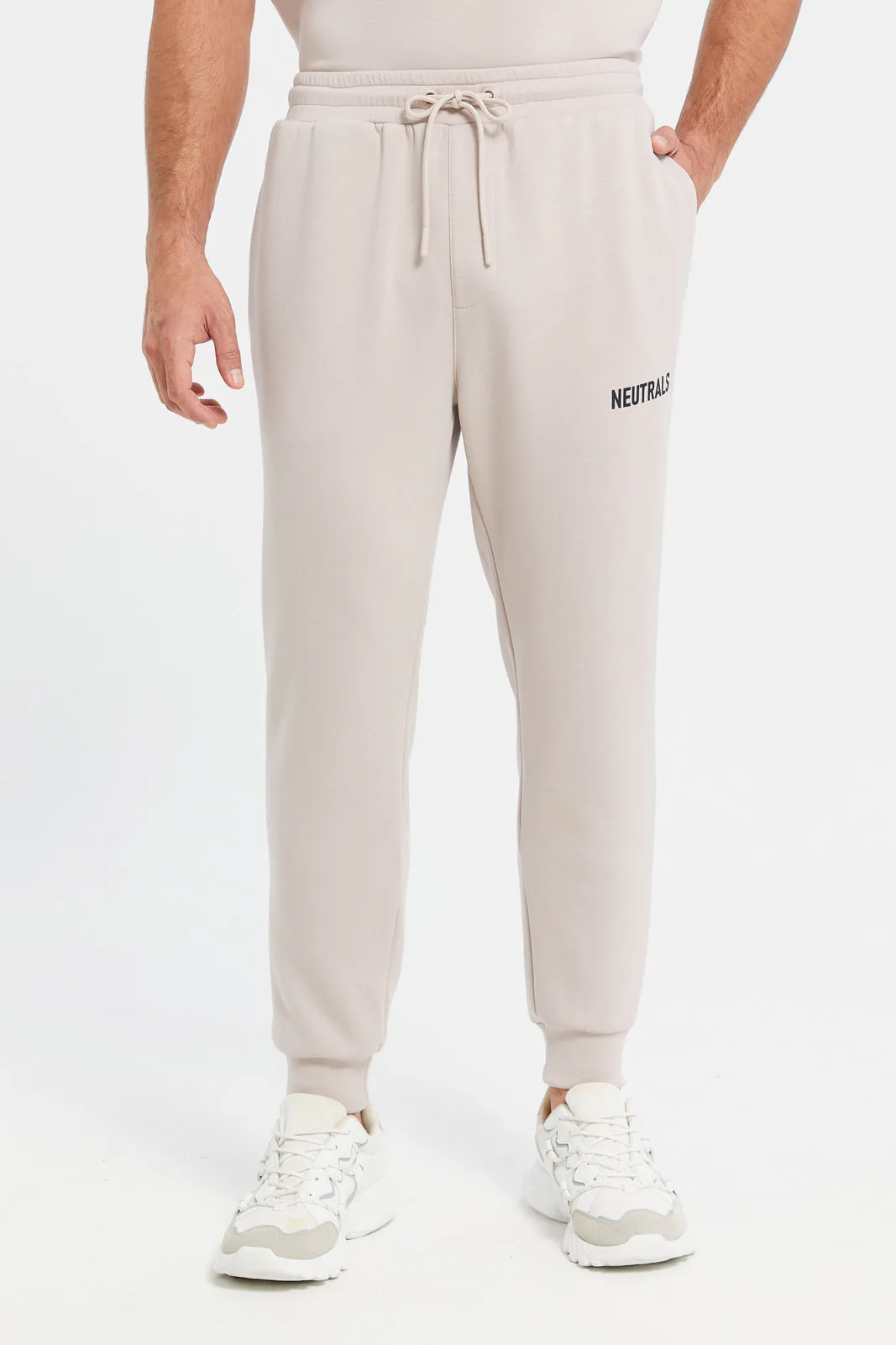 Men Beige Elasticated Waistband Active Trousers sold by Redtag
